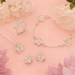 
                  
                    Silver, White Enamel & Diamond Flower Bracelet
                  
                