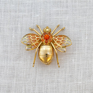 
                  
                    18ct yellow gold, orange sapphire and enamel wasp brooch
                  
                
