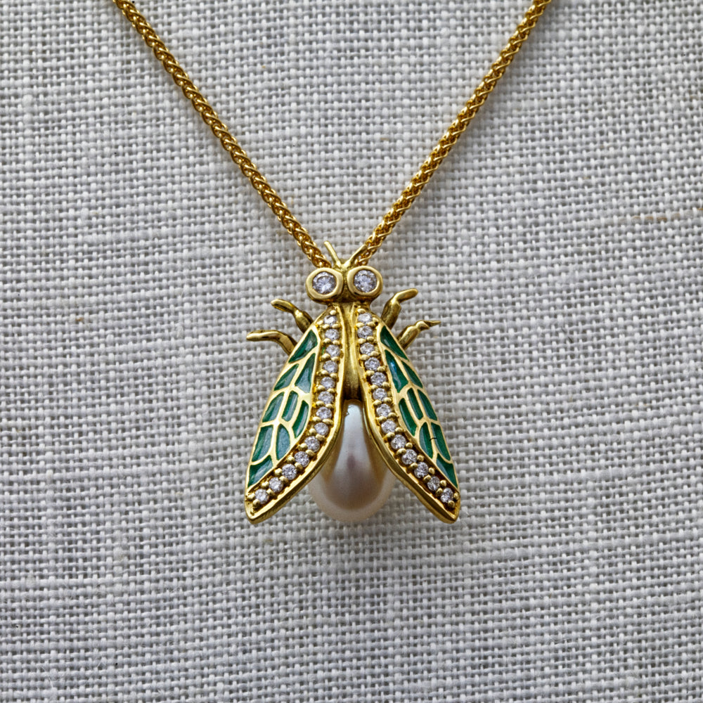 
                  
                    18ct yellow gold, pearl, diamond and enamel fly necklace
                  
                