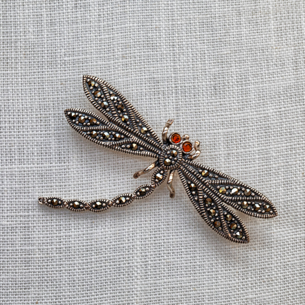 
                  
                    Sterling silver, marcasite and garnet dragonfly brooch
                  
                